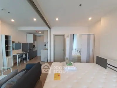 Modern studio apartment with open layout and stylish furnishings