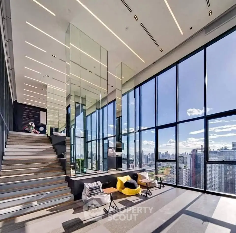 Luxurious modern living room with panoramic city views and stylish decor