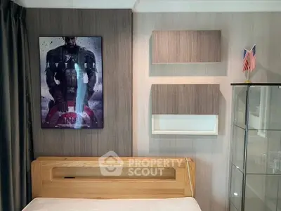 Modern bedroom with stylish decor and wooden bed frame, featuring a superhero-themed wall art.