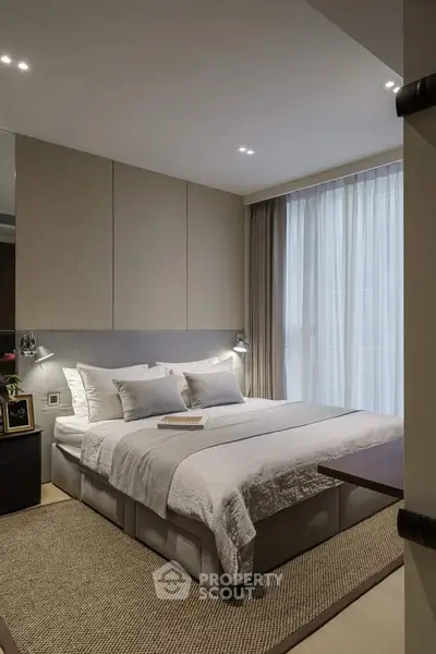 Luxurious modern bedroom with elegant decor and natural light