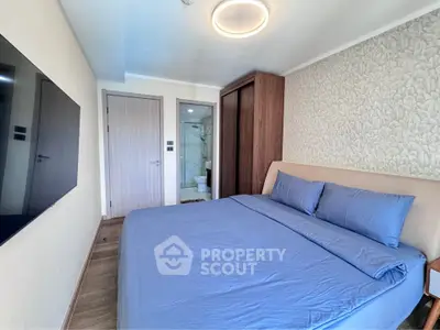 Modern bedroom with ensuite bathroom and stylish decor