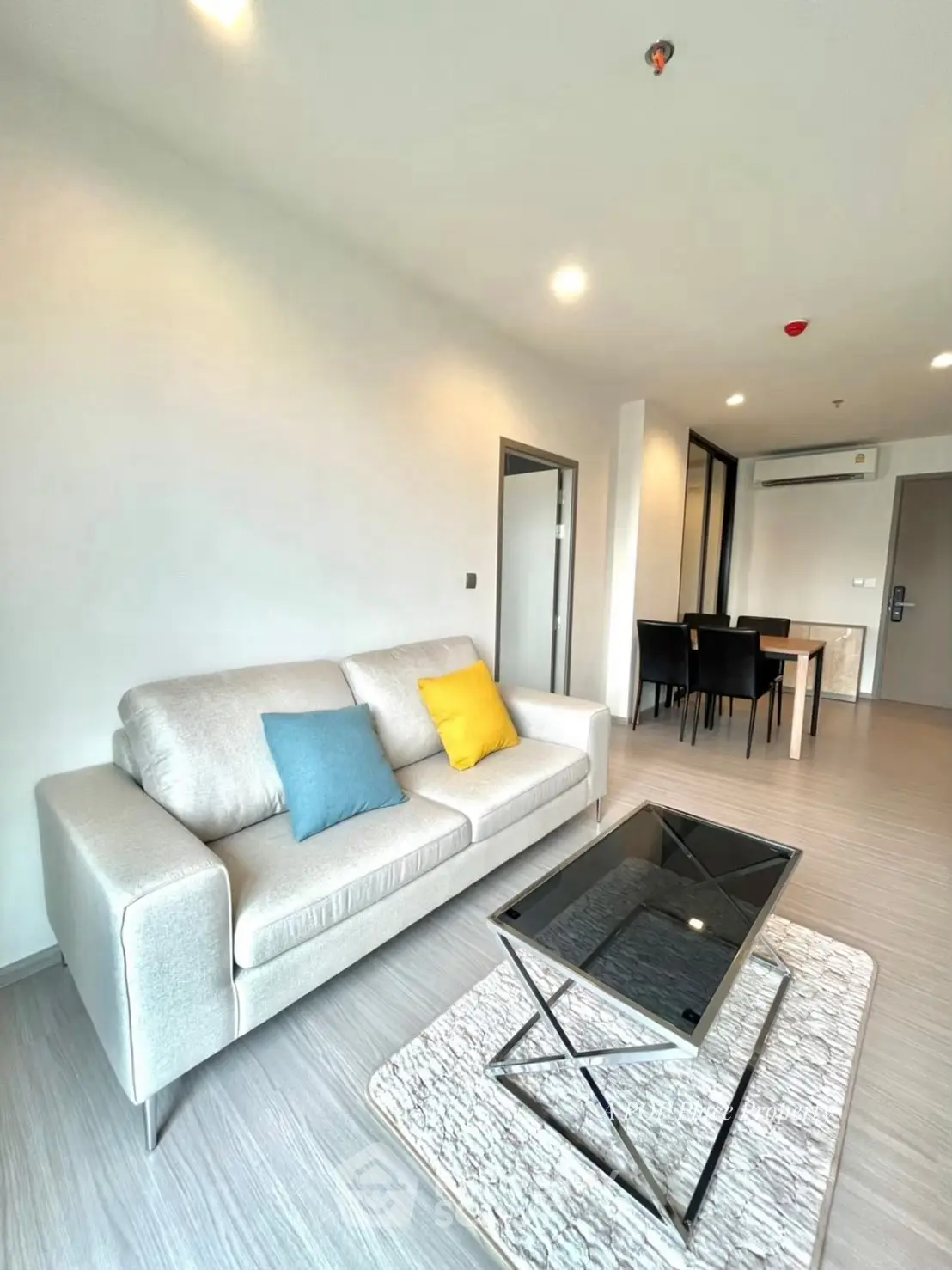 Modern living room with stylish furniture and open layout, perfect for contemporary living.