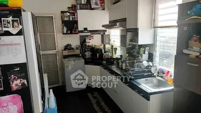 Cozy kitchen with modern appliances and ample natural light