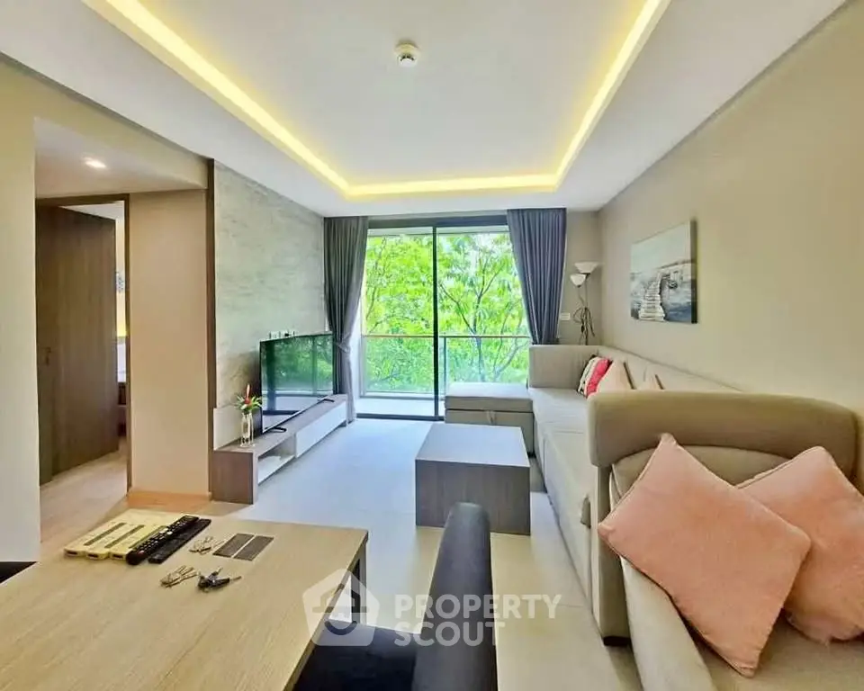 Modern living room with large windows and stylish decor