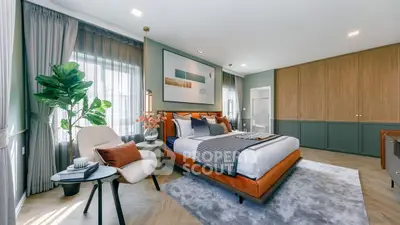 Luxurious modern bedroom with stylish decor and ample natural light