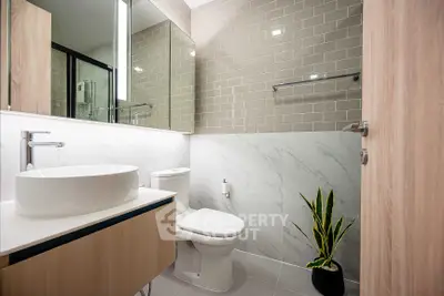 Modern bathroom with sleek fixtures and stylish tile design