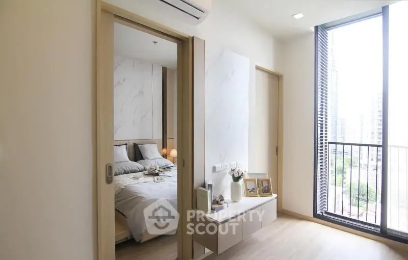 Modern bedroom with balcony view and stylish decor
