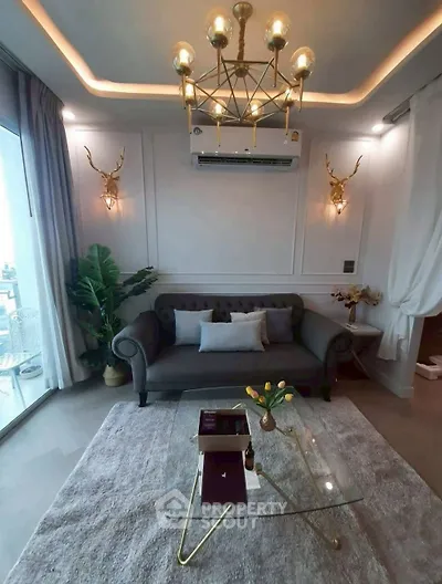 Luxurious living room with elegant decor and modern lighting