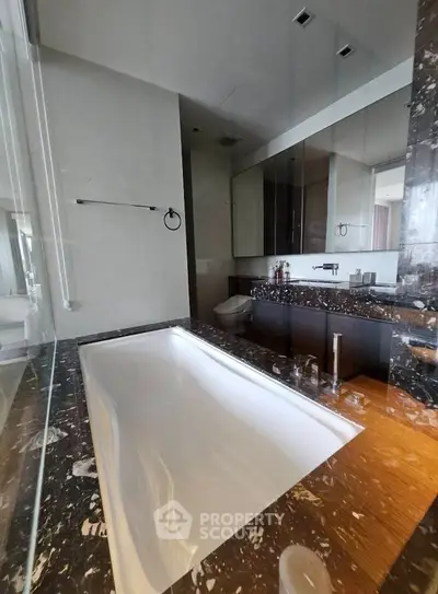 Luxurious bathroom with elegant marble finishes and modern fixtures
