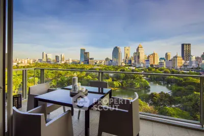 Luxurious balcony with stunning city skyline and park view, perfect for relaxation and entertainment.