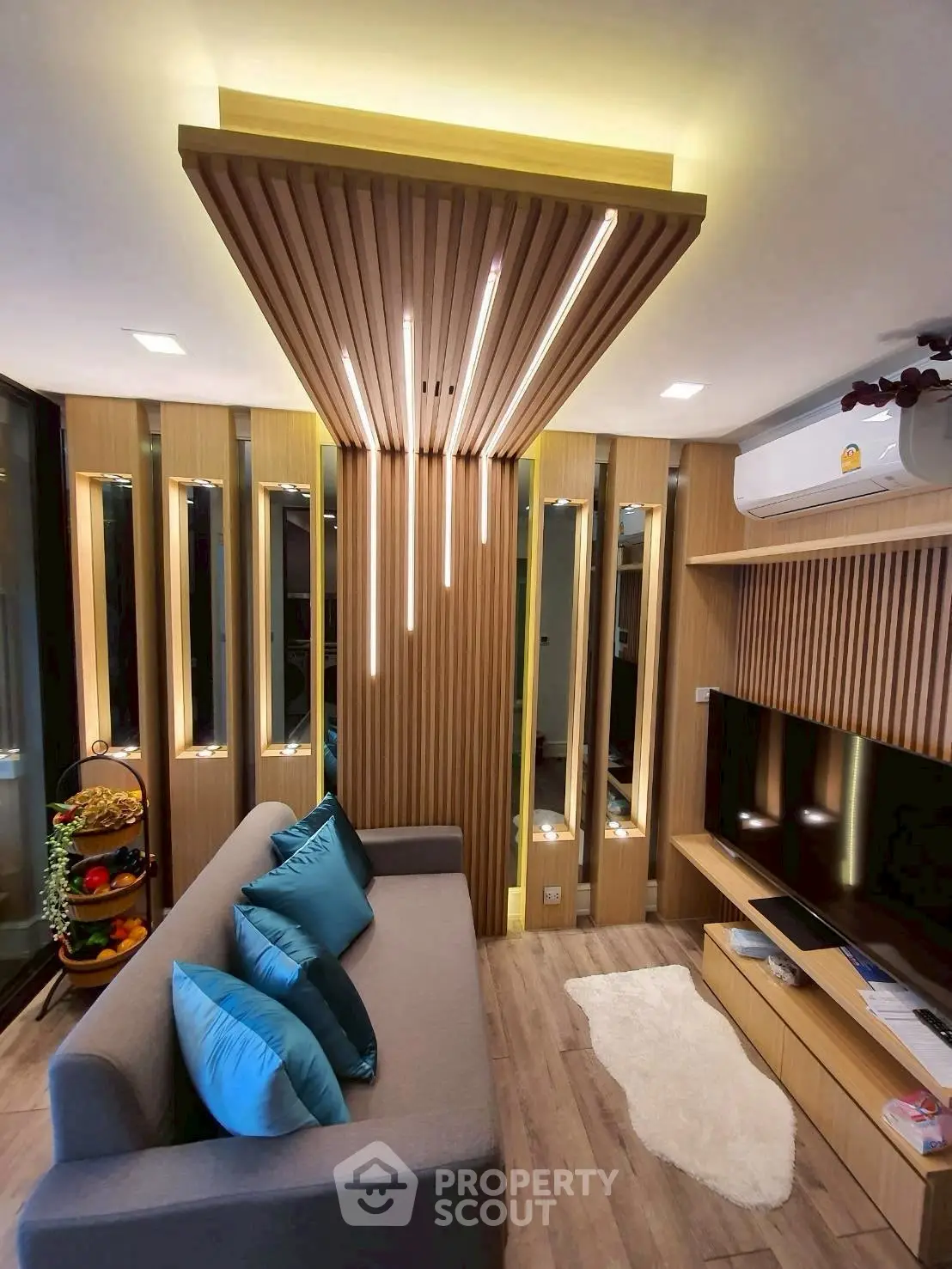 Modern living room with stylish lighting and cozy seating area