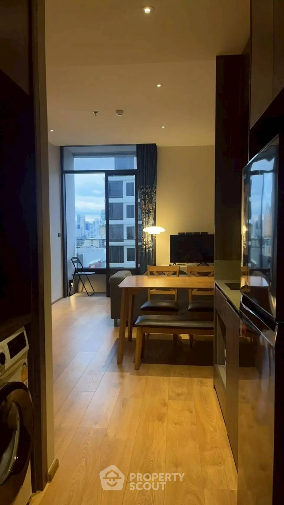 Modern apartment interior with open layout and city view