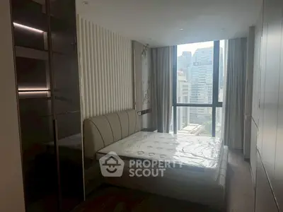Modern bedroom with city view and stylish decor