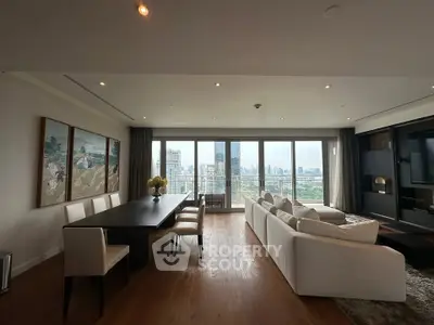Luxurious living room with stunning city view and elegant dining area