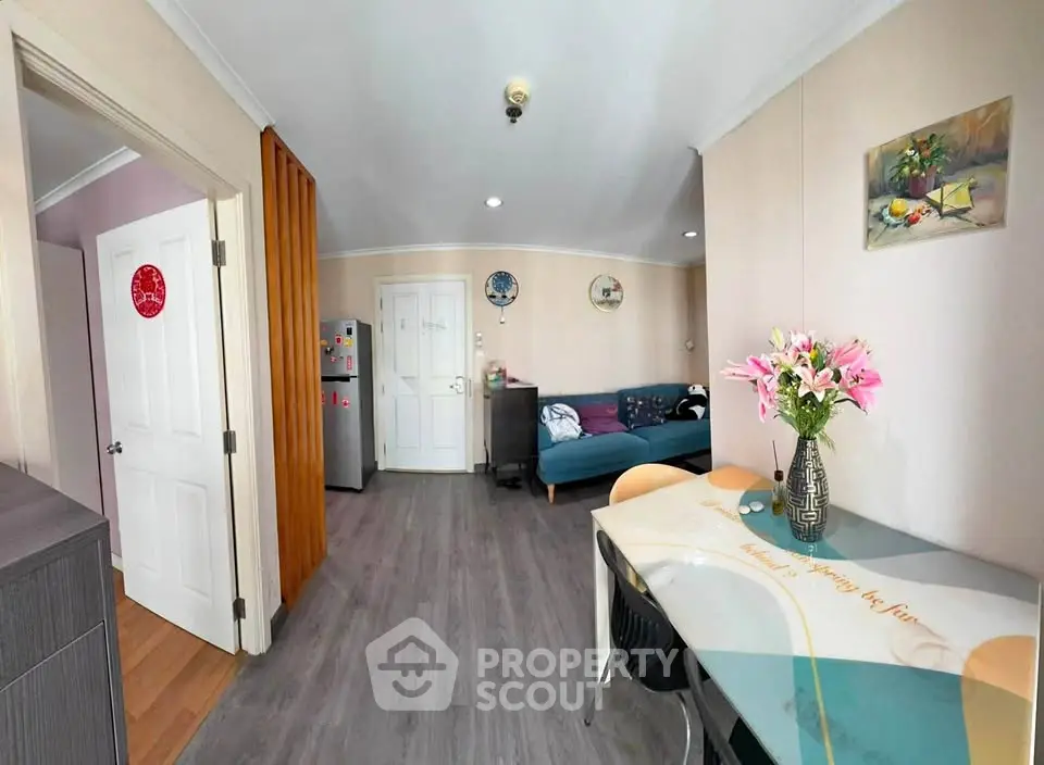 Charming living room with modern decor and stylish furniture, perfect for cozy gatherings.