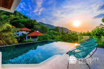 Stunning infinity pool with breathtaking sunset view in tropical paradise