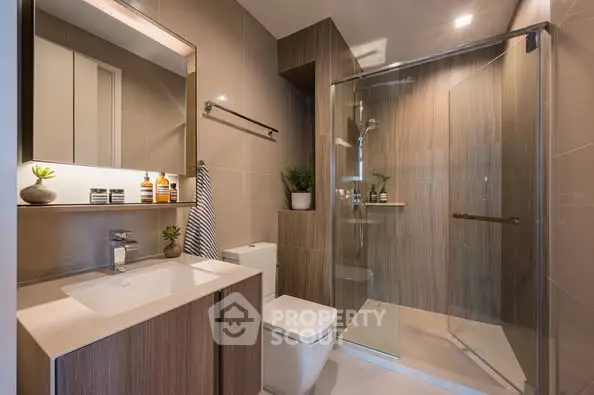 Modern bathroom with sleek design and glass shower enclosure