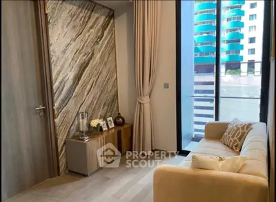 Modern living room with elegant decor and city view balcony