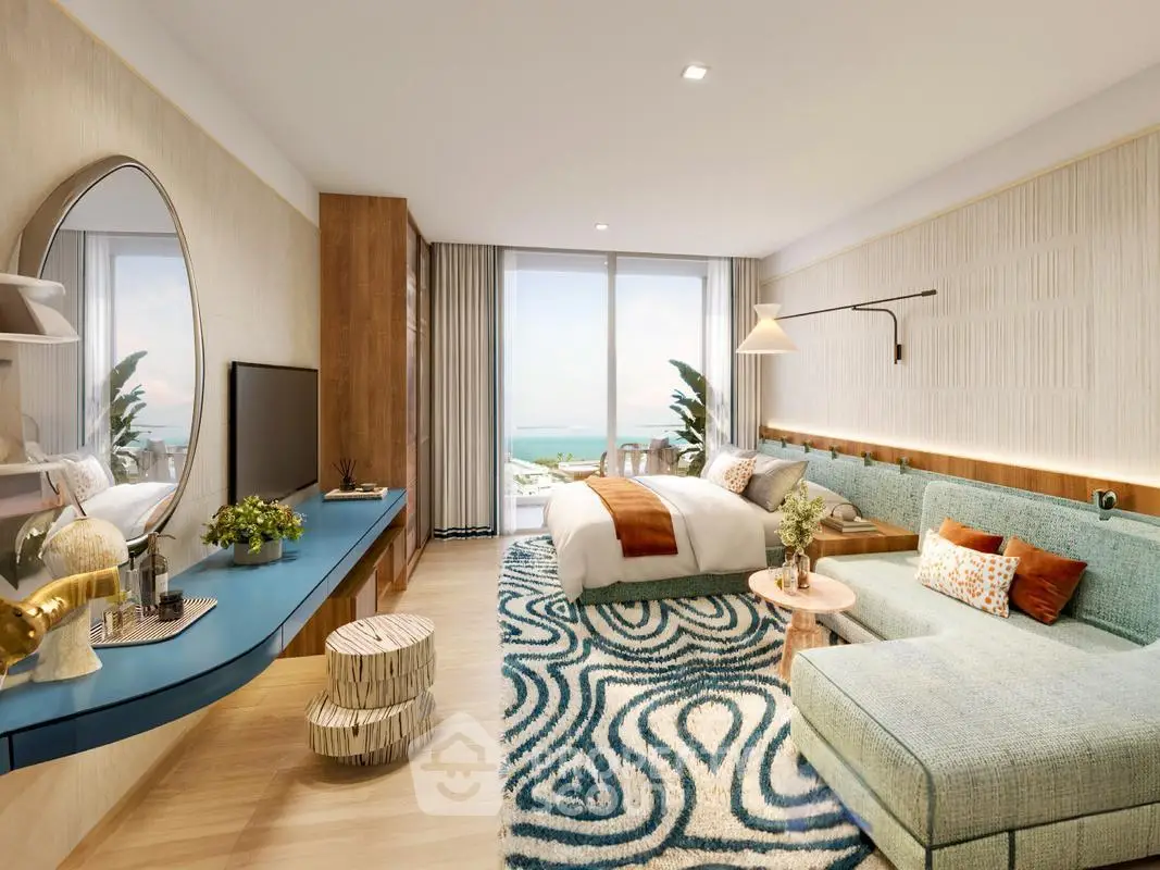 Luxurious modern living room with ocean view, stylish decor, and spacious layout.