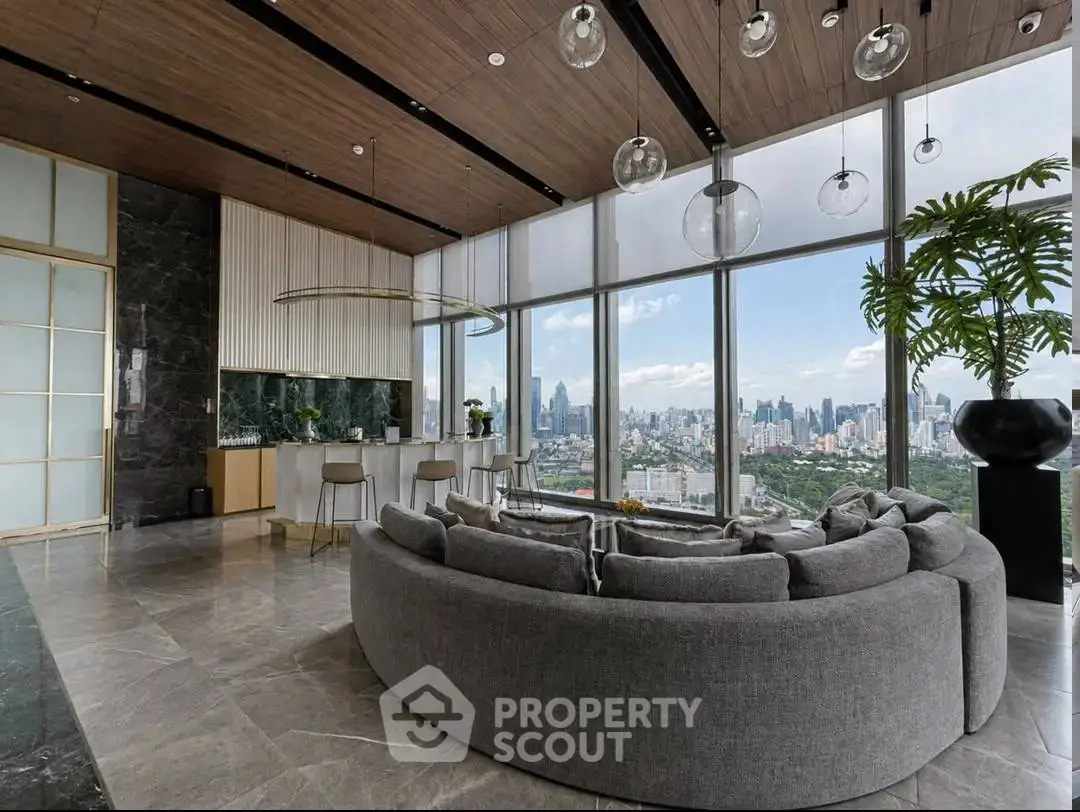 Luxurious modern living room with panoramic city views and elegant decor