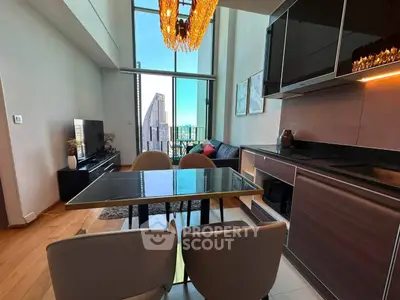 Luxurious modern living room with open kitchen and stunning city view