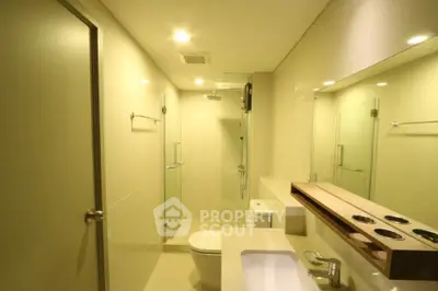 Modern bathroom with sleek design and glass shower enclosure