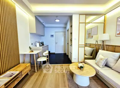 Modern living room with open kitchen and stylish decor