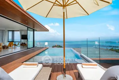 Luxurious villa with infinity pool and stunning ocean view, perfect for relaxation and entertainment.