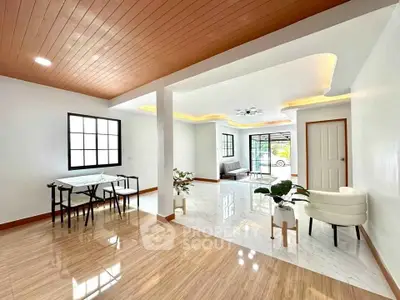 Spacious modern living room with elegant dining area and stylish decor