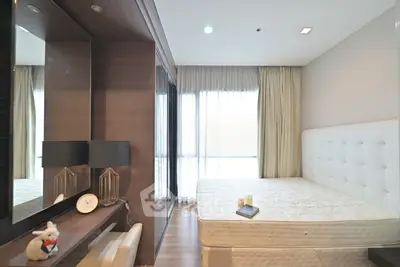 Modern bedroom with elegant decor and natural light