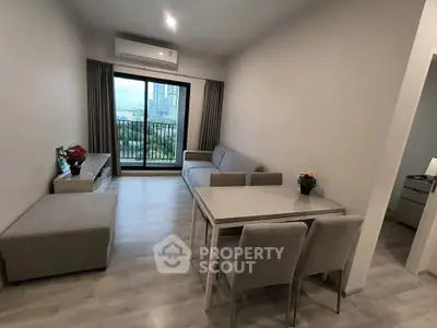 Modern living room with balcony view in a stylish apartment