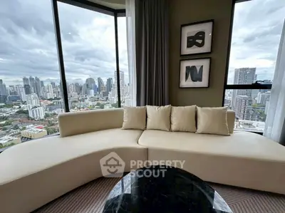 Luxurious living room with panoramic city view and elegant curved sofa