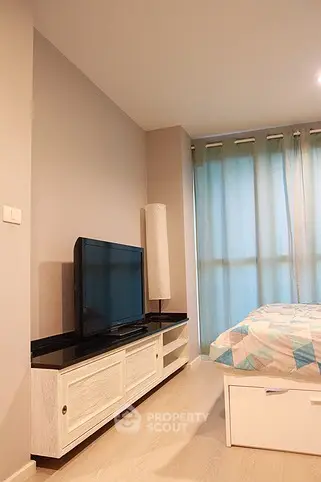 Cozy bedroom with modern decor and natural light
