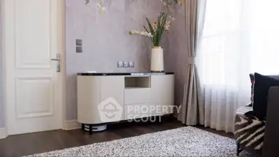 Elegant living room with modern sideboard and stylish decor