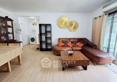 Spacious living room with modern furniture and natural light