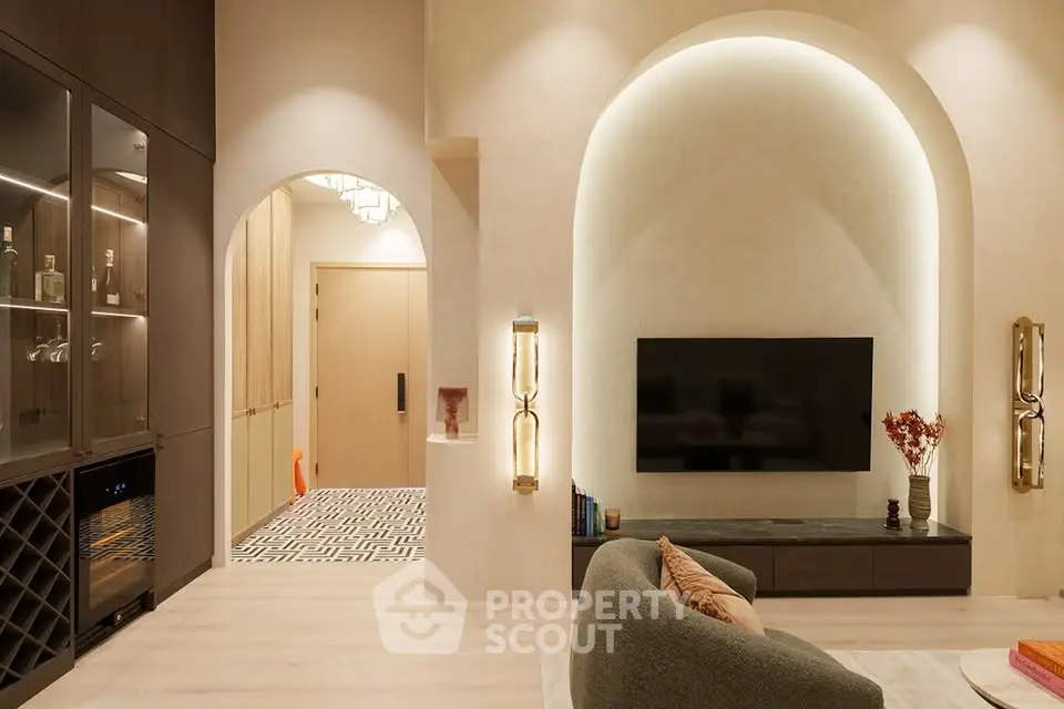 Luxurious modern living room with elegant archway and stylish decor