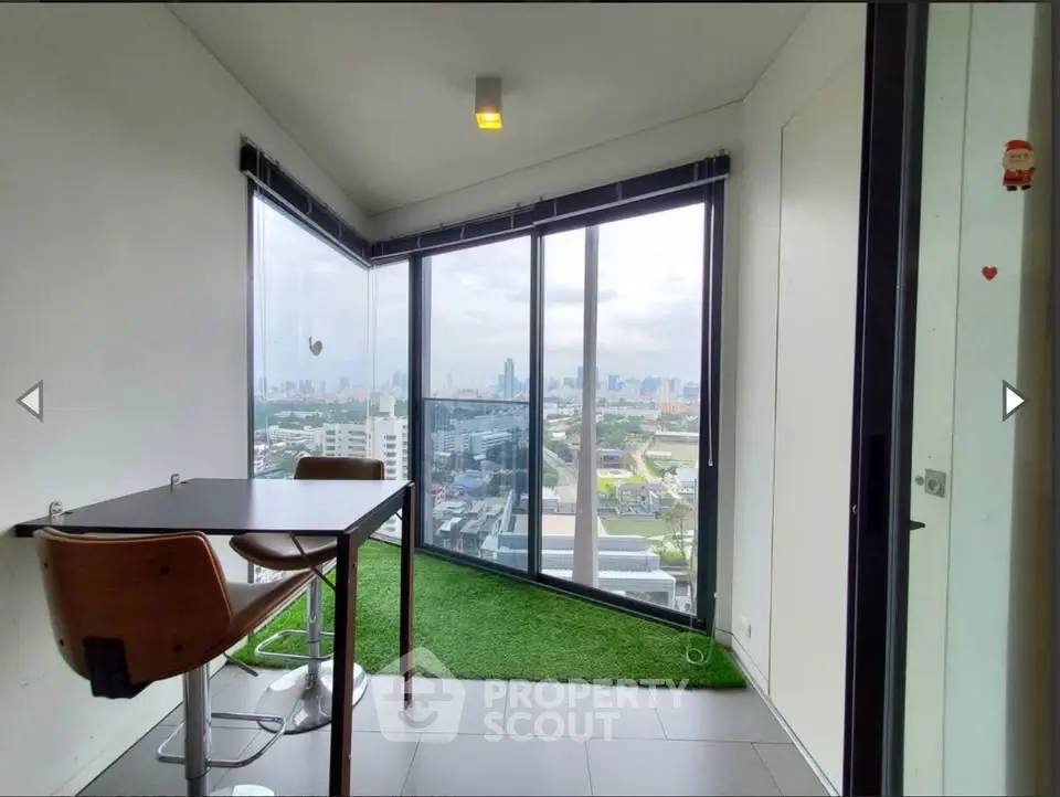 Modern corner unit with panoramic city view and stylish interior design.