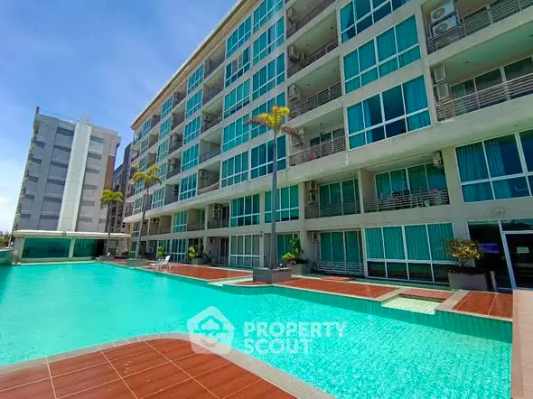 Luxurious apartment building with stunning pool and modern design