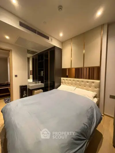 Luxurious bedroom with elegant decor and plush bedding in modern apartment