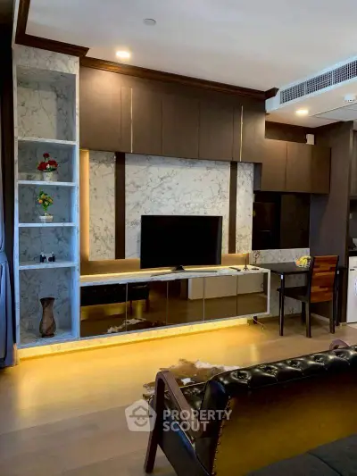 Luxurious living room with modern decor and elegant marble accents