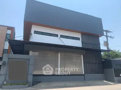 Modern commercial building with sleek facade and large windows