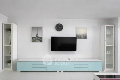 Modern living room with sleek TV unit and elegant decor