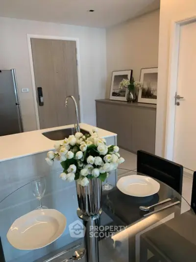 Modern kitchen with sleek design and elegant dining setup