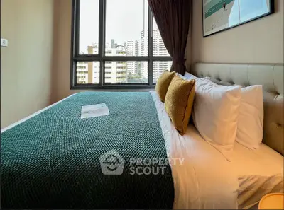 Modern bedroom with city view and stylish decor