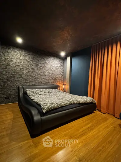 Luxurious modern bedroom with stylish decor and ambient lighting