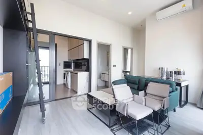 Modern living room with open layout and stylish furniture in a contemporary apartment.