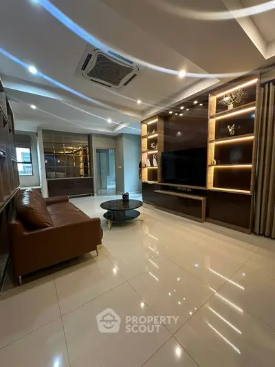 Luxurious modern living room with elegant lighting and sleek furniture