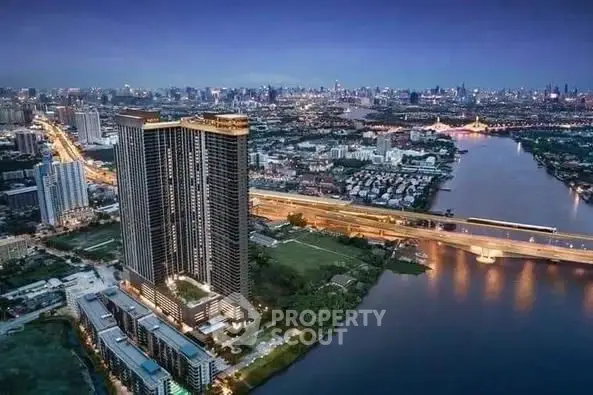 Stunning high-rise building with river view in vibrant cityscape