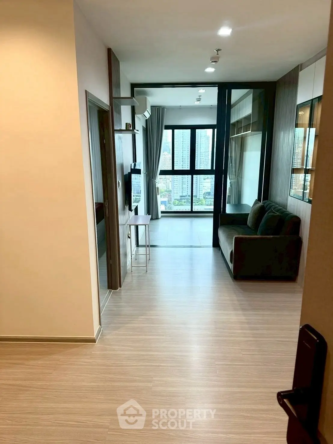 Modern apartment interior with open layout and city view