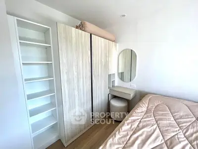 Cozy bedroom with modern wardrobe and stylish decor